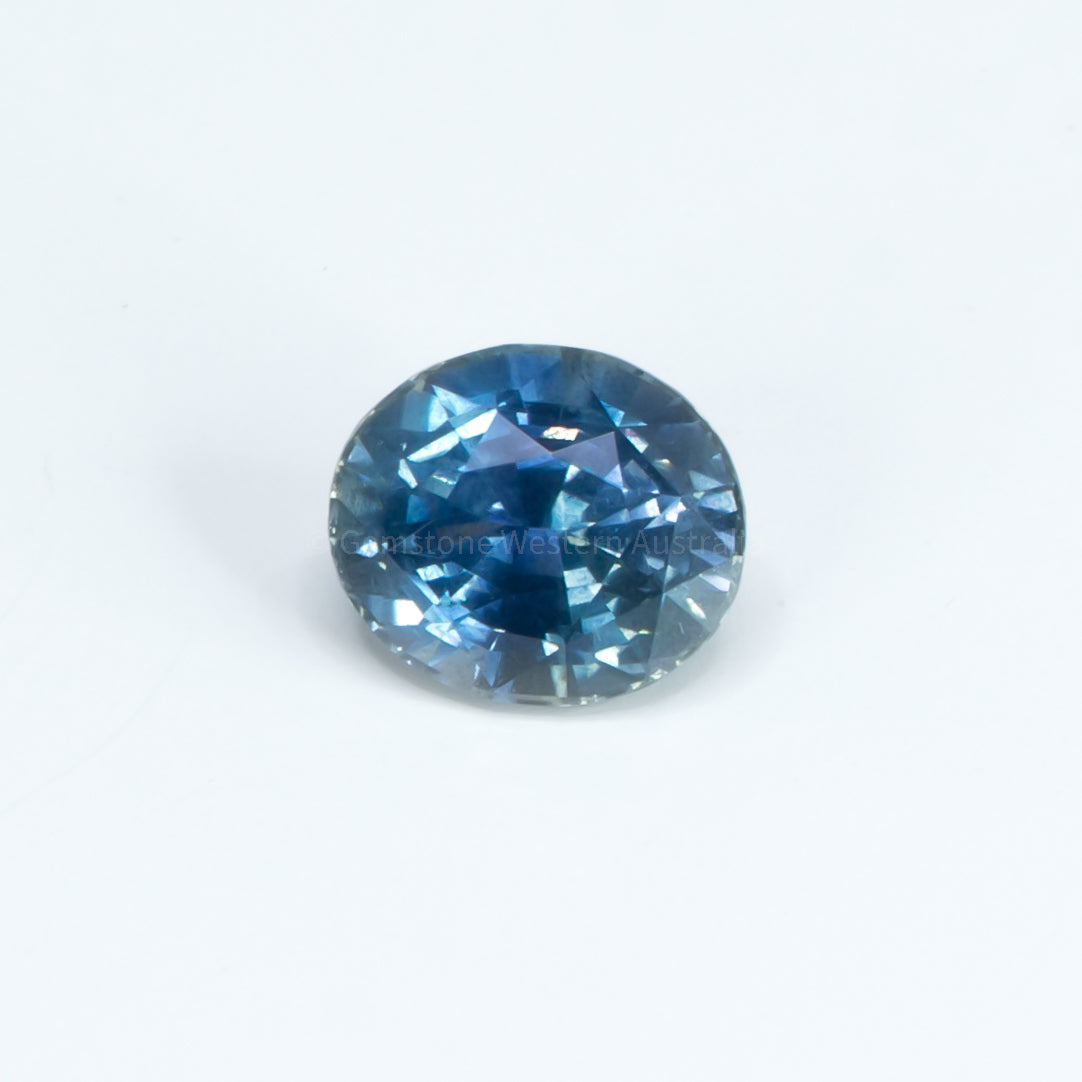 4.06ct Oval Mixed Cut Natural Unheated Teal Bluish Green Sapphire in neutral background