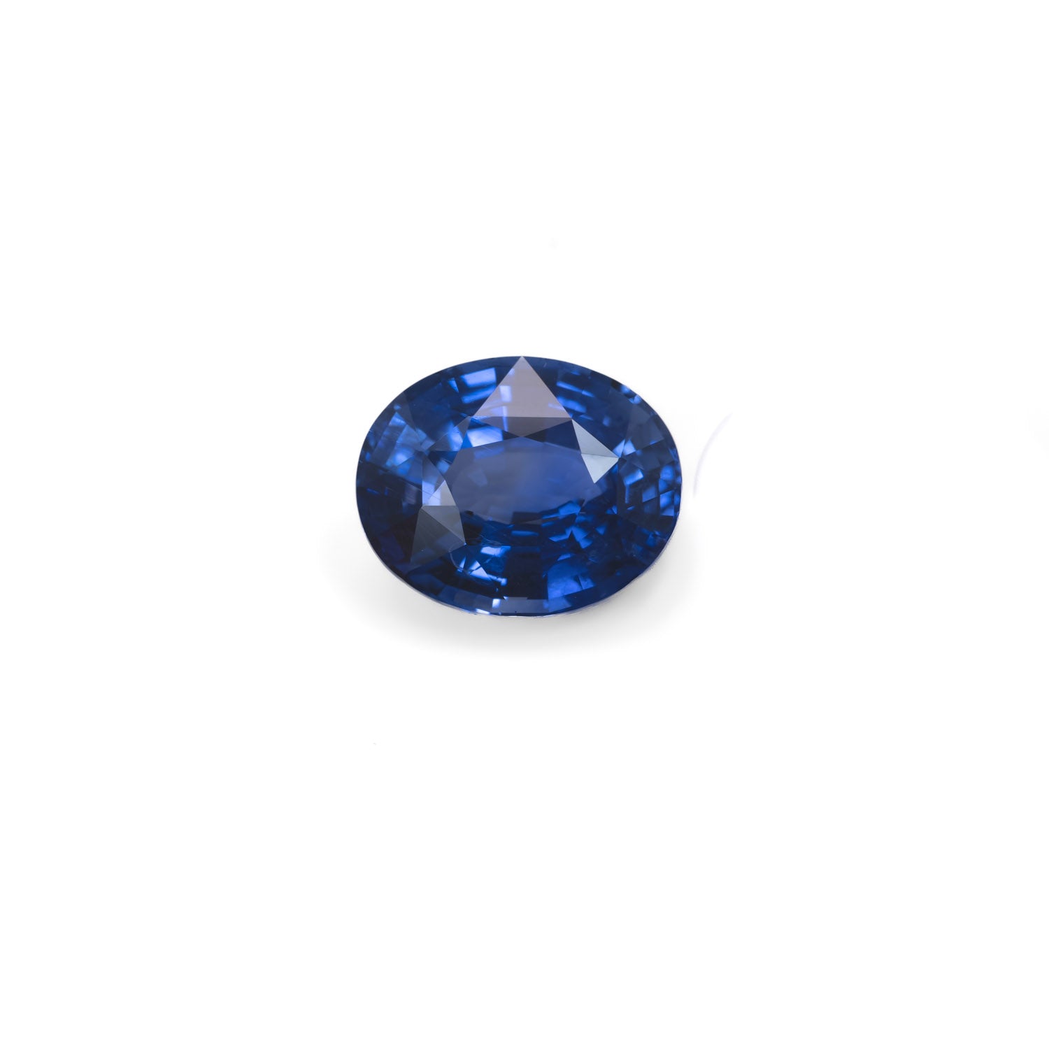 loose 5.35ct Natural Blue Sapphire – Oval Mixed Cut | Vivid Cornflower Blue in white background