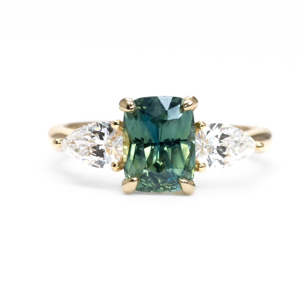 Three stone sapphire diamond ring