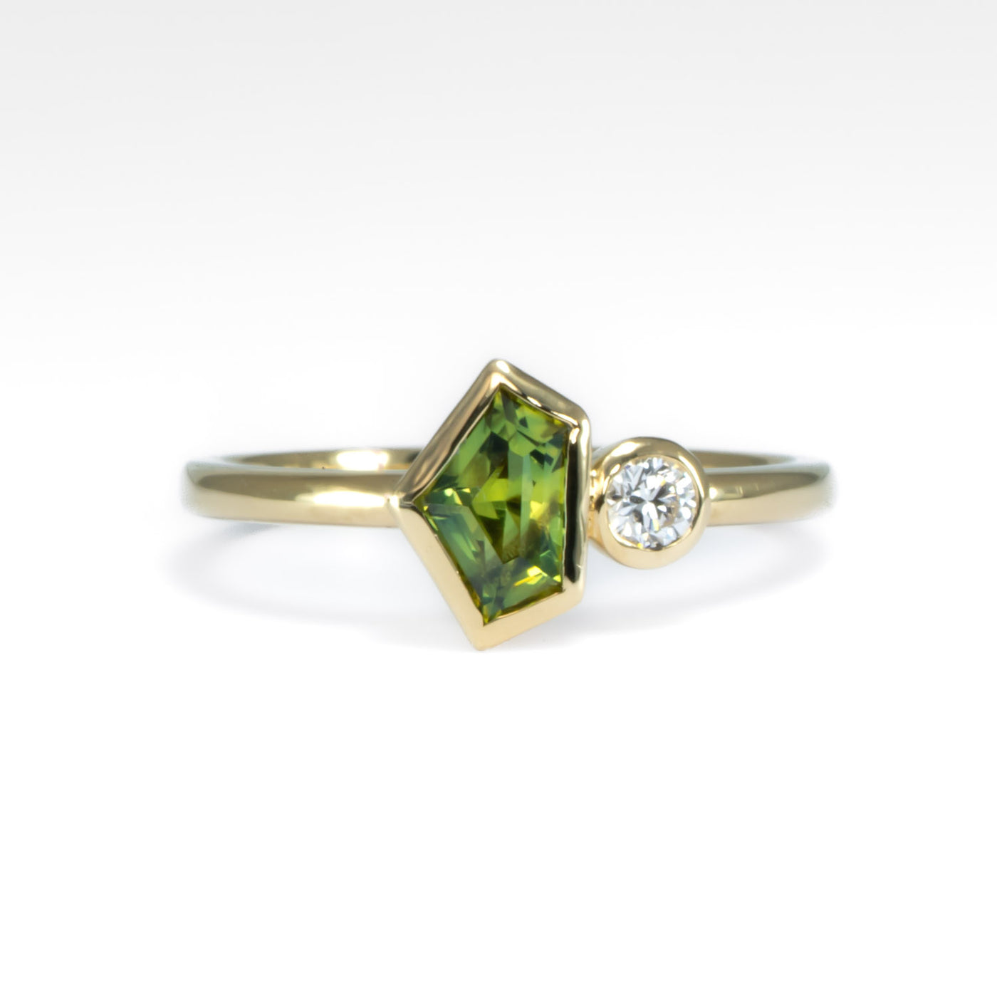 Toi et Moi  teal green sapphire and diamond ring